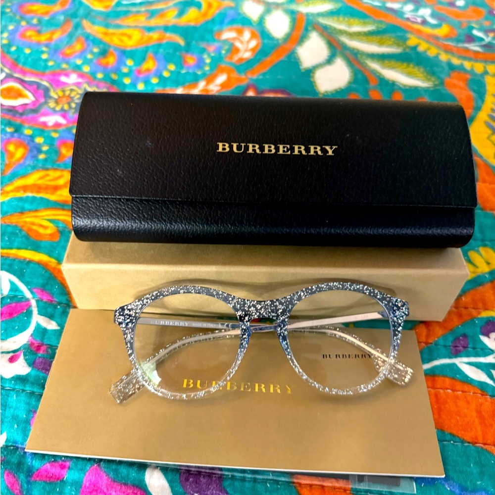 Burberry women's glasses Blue with silver speckle. They are beautiful.
